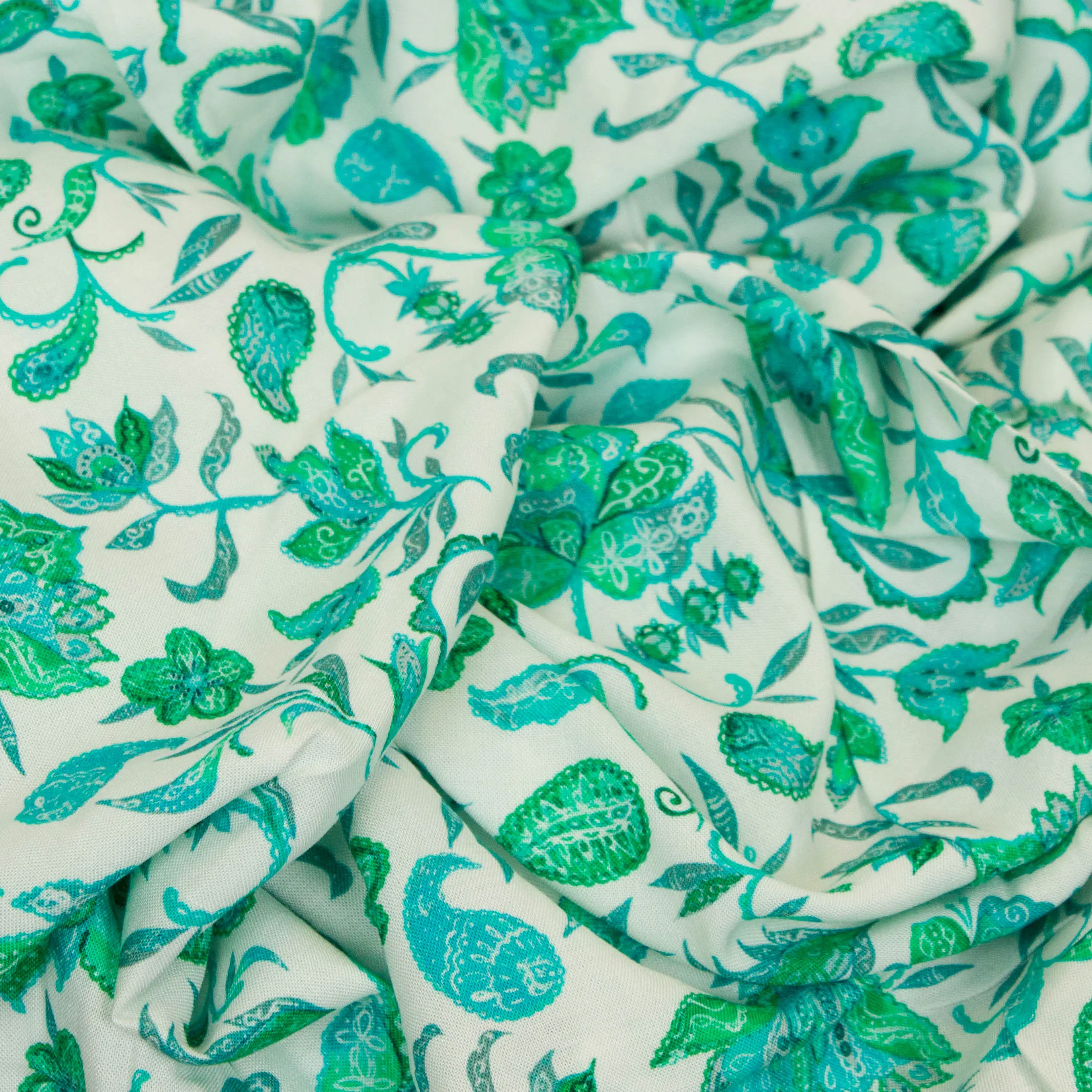 Witte viscose met groene retro bloemen